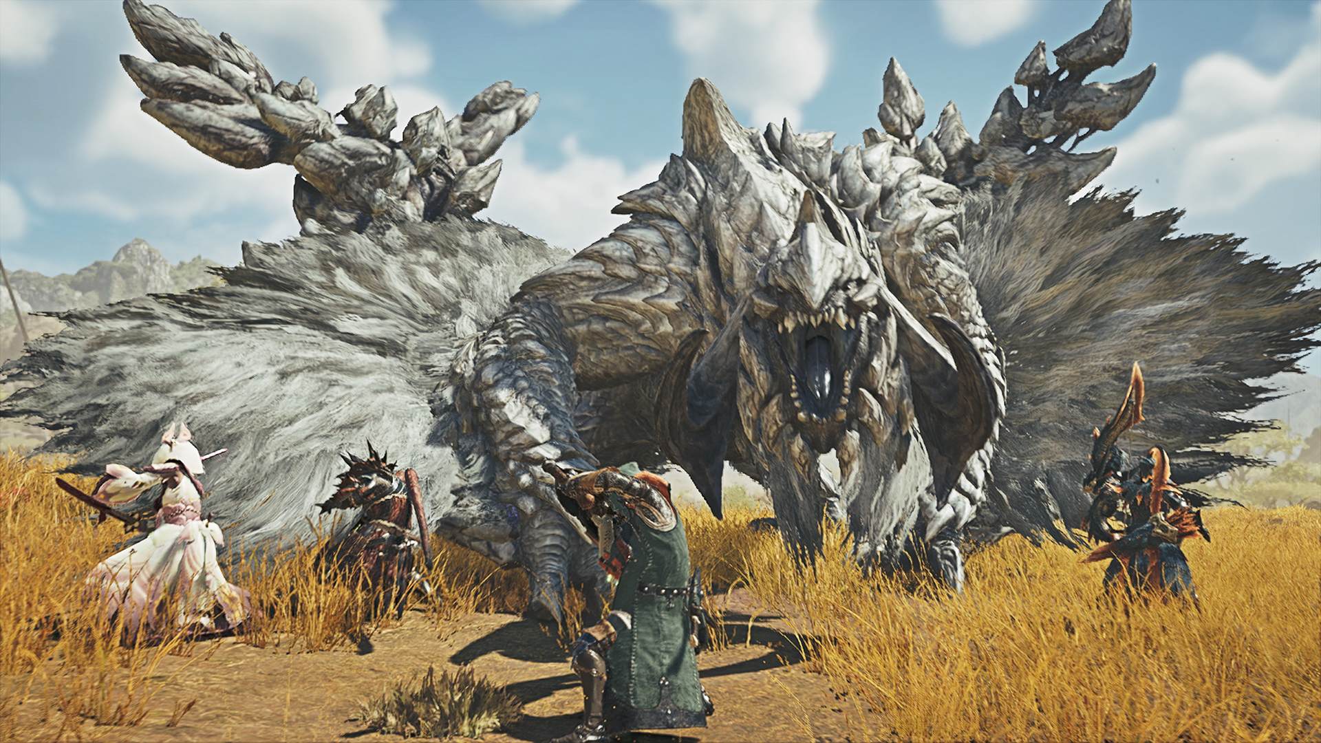A group of Monster Hunter Wilds hunters confronting a large horned monster in a grassland